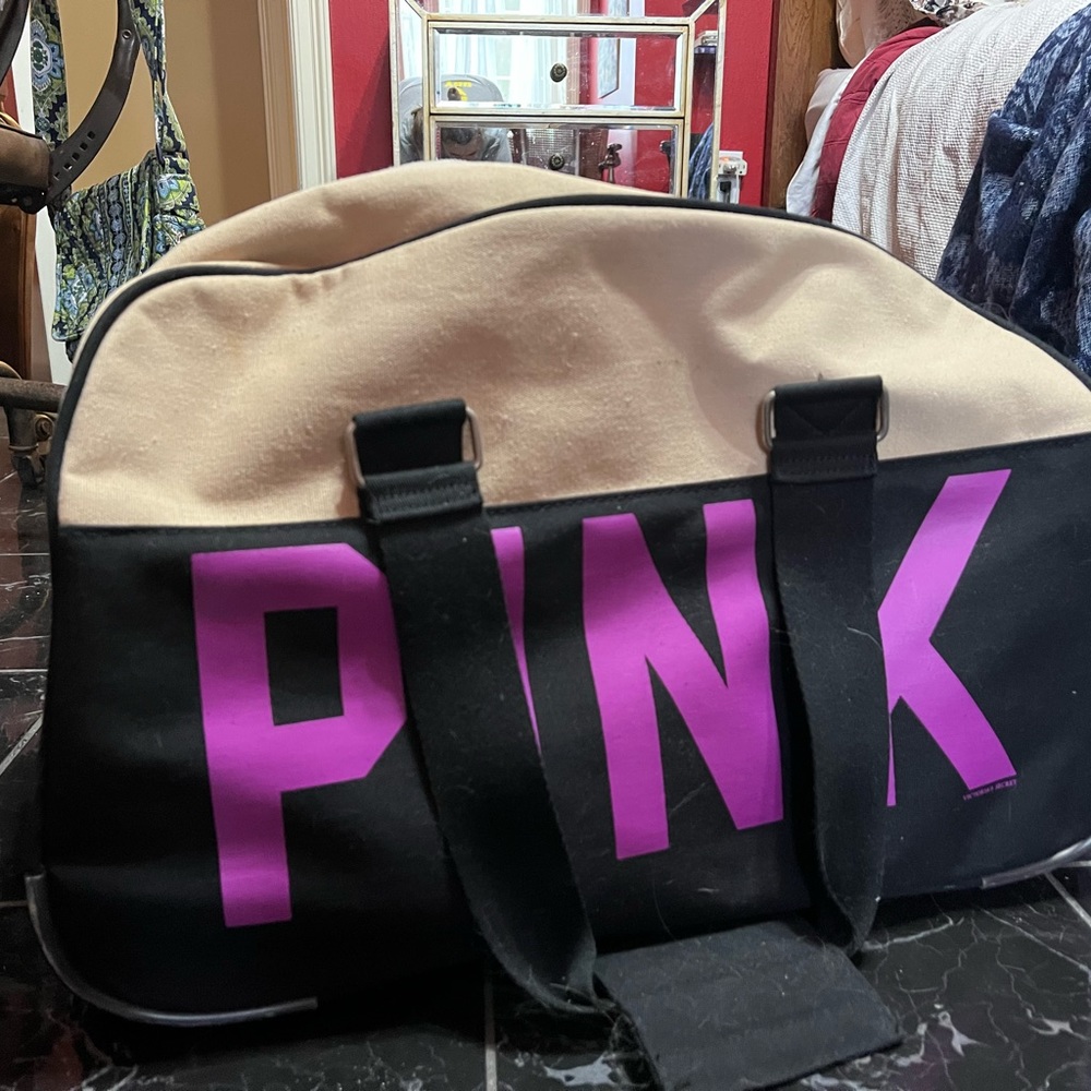 Victoria’s Secret pink duffel suitcase